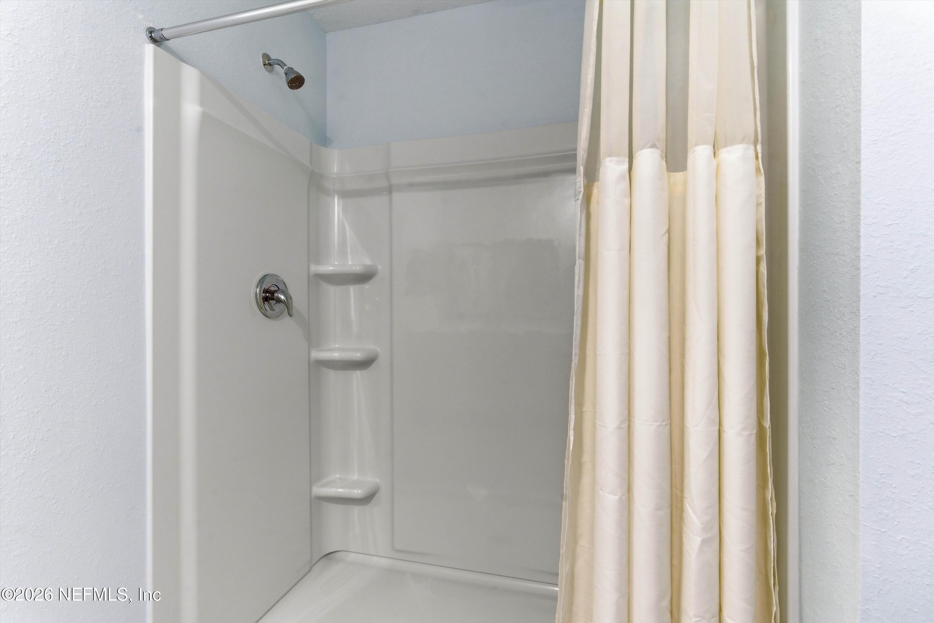 103 Seaport Breeze Road St. Augustine, FL 32095 - Photo 21 of 44 a bathroom with a shower