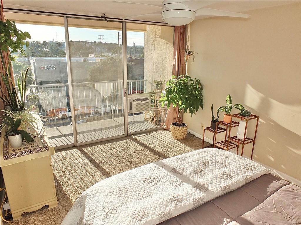 1770 Ximeno Avenue, Unit 314 Long Beach, CA 90815 - Photo 1 of 37 a view of a living room with furniture