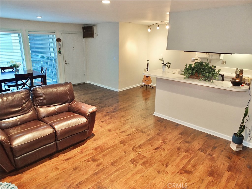 1770 Ximeno Avenue, Unit 314 Long Beach, CA 90815 - Photo 14 of 37 a living room with a couch