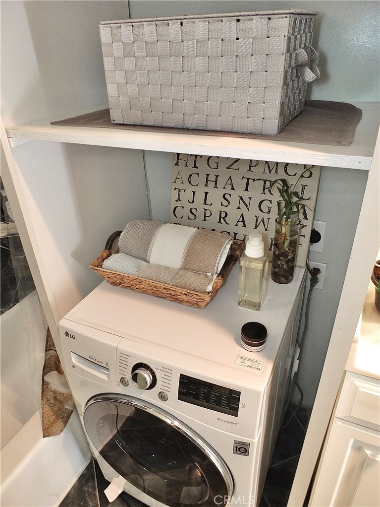 1770 Ximeno Avenue, Unit 314 Long Beach, CA 90815 - Photo 20 of 37 a utility room with dryer and washer