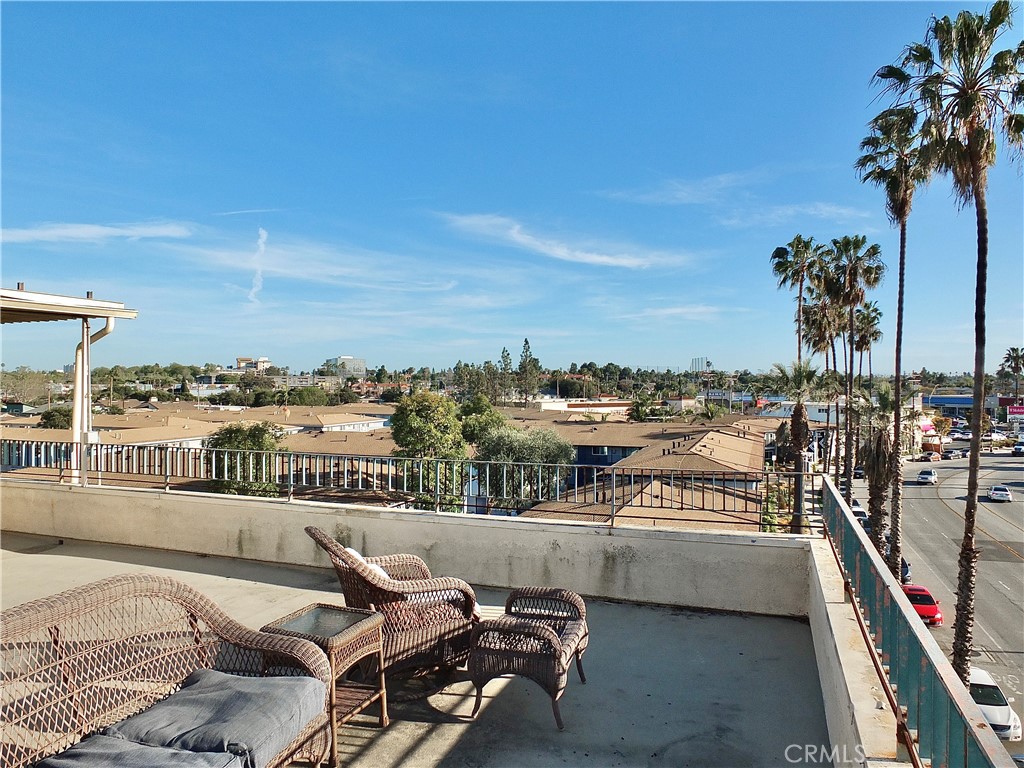 1770 Ximeno Avenue, Unit 314 Long Beach, CA 90815 - Photo 23 of 37 a view of a balcony with furniture