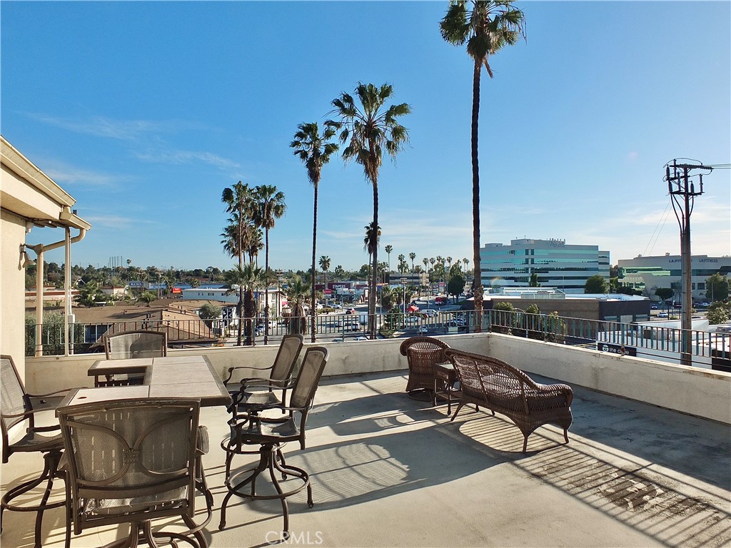 1770 Ximeno Avenue, Unit 314 Long Beach, CA 90815 - Photo 24 of 37 a view of a terrace with furniture