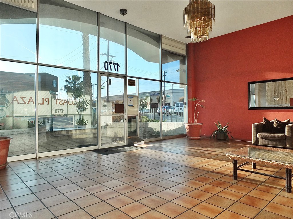 1770 Ximeno Avenue, Unit 314 Long Beach, CA 90815 - Photo 3 of 37 a sitting area with glass door