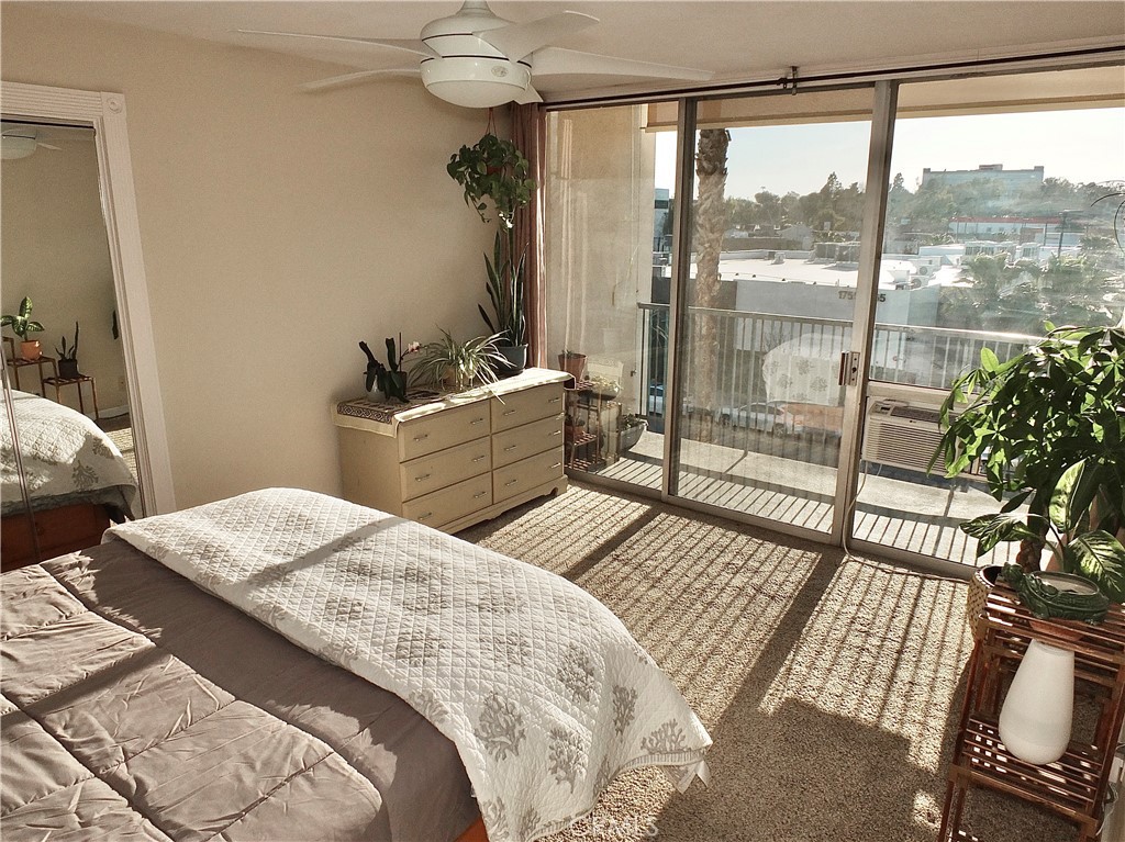 1770 Ximeno Avenue, Unit 314 Long Beach, CA 90815 - Photo 9 of 37 a bedroom with a bed and a window