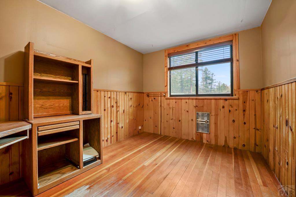 9600 Middle Creek Canyon Road Beulah, CO 81023 - Photo 19 of 50 a view of a livingroom with wooden floor