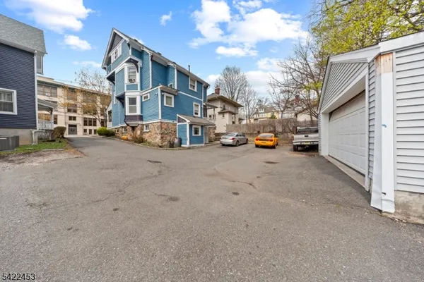 a view of a street with cars