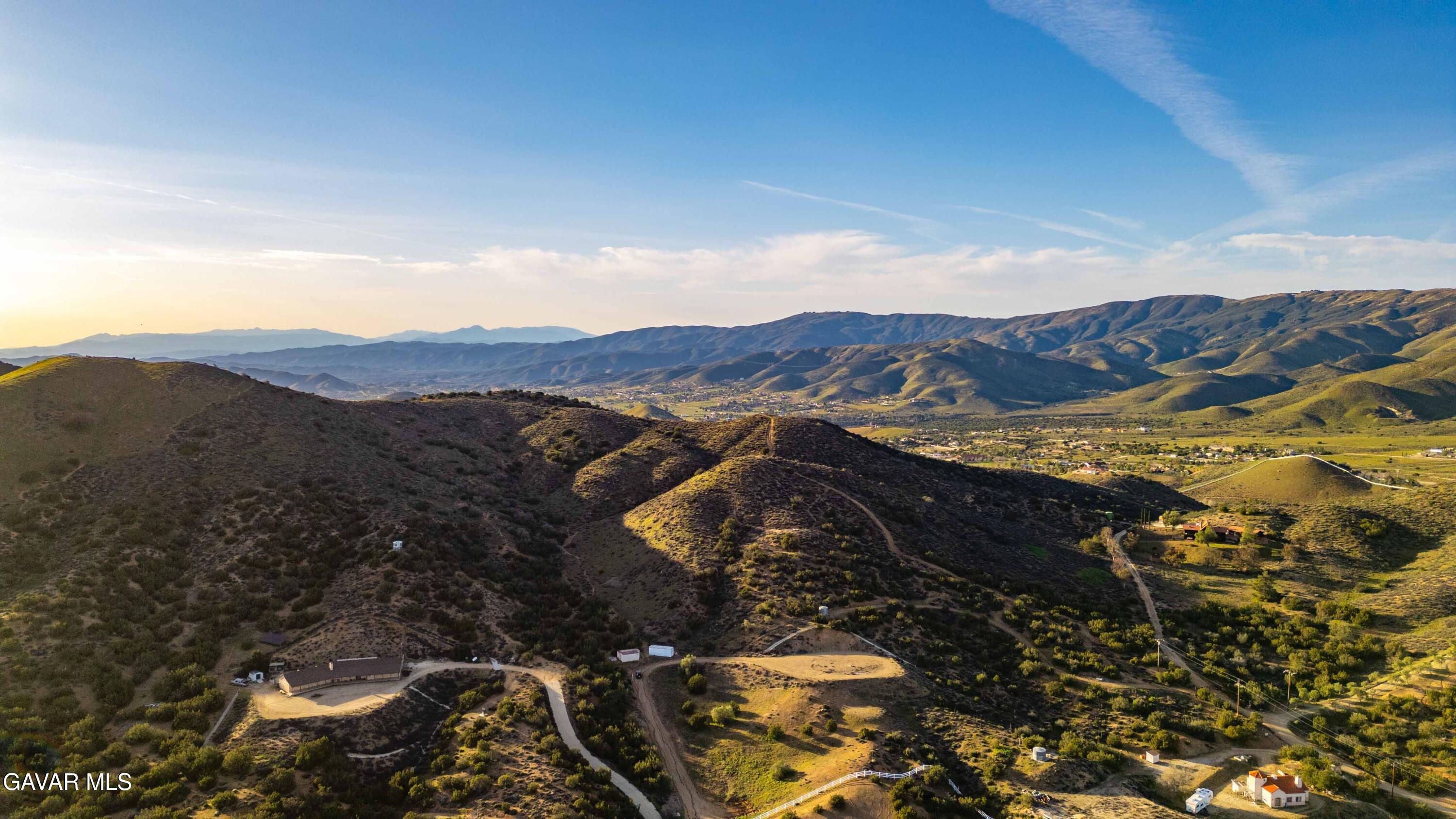 Vic Quail Road Santa Clarita, CA 91390 - Photo 12 of 12 a view of a house with a mountain
