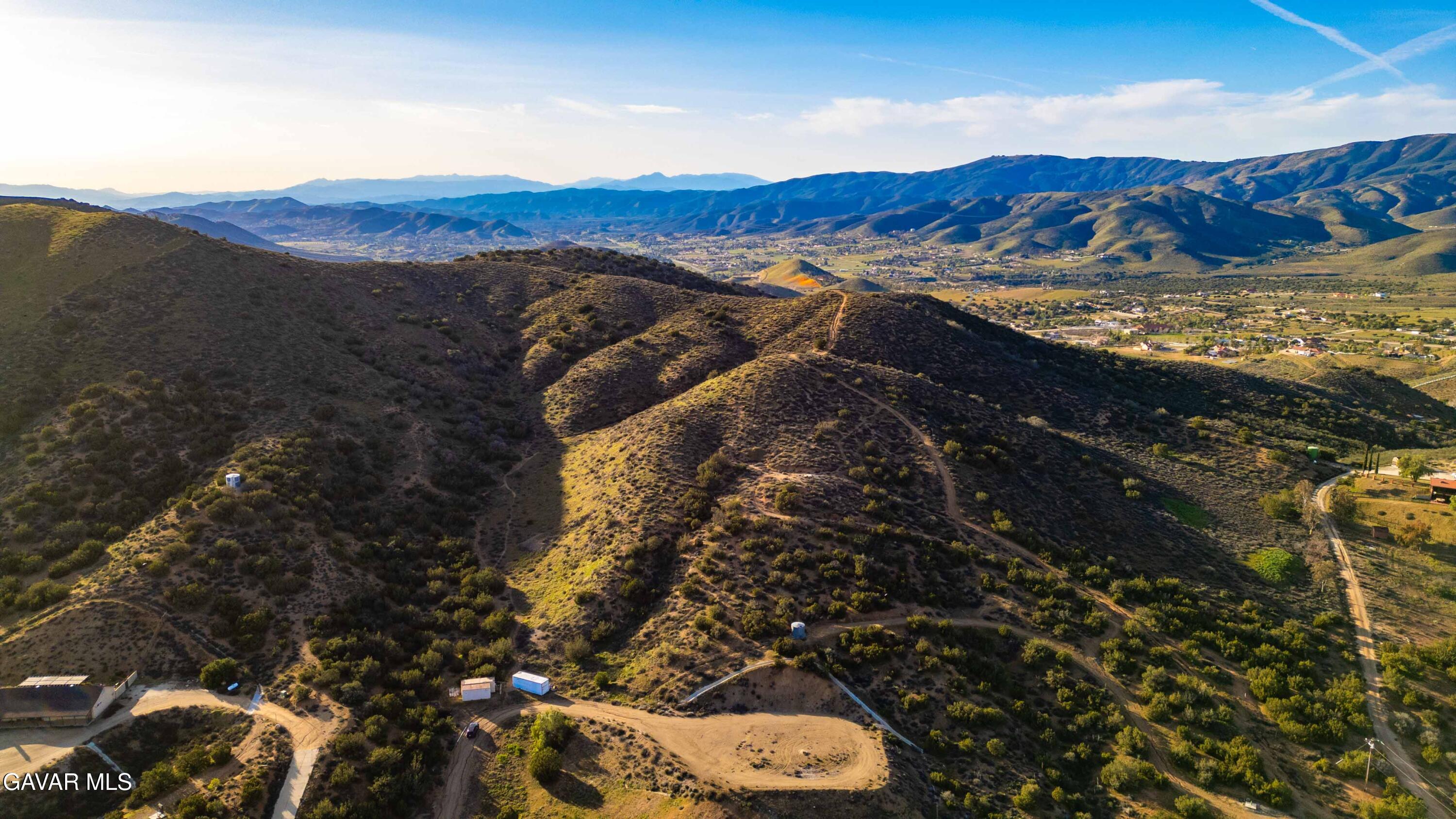 Vic Quail Road Santa Clarita, CA 91390 - Photo 4 of 12 a view of a city with mountains in the background