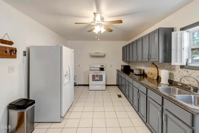 a room with furniture and a window