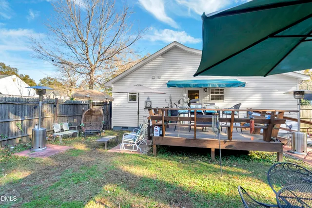 a bathroom with a toilet a sink and a mirror