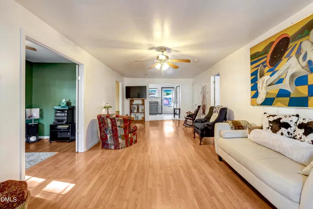 a view of front door deck and patio