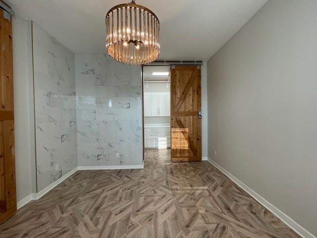 622 Hemphill Street, Unit 202 Fort Worth, TX 76104 - Photo 9 of 15 en empty room with wooden floor