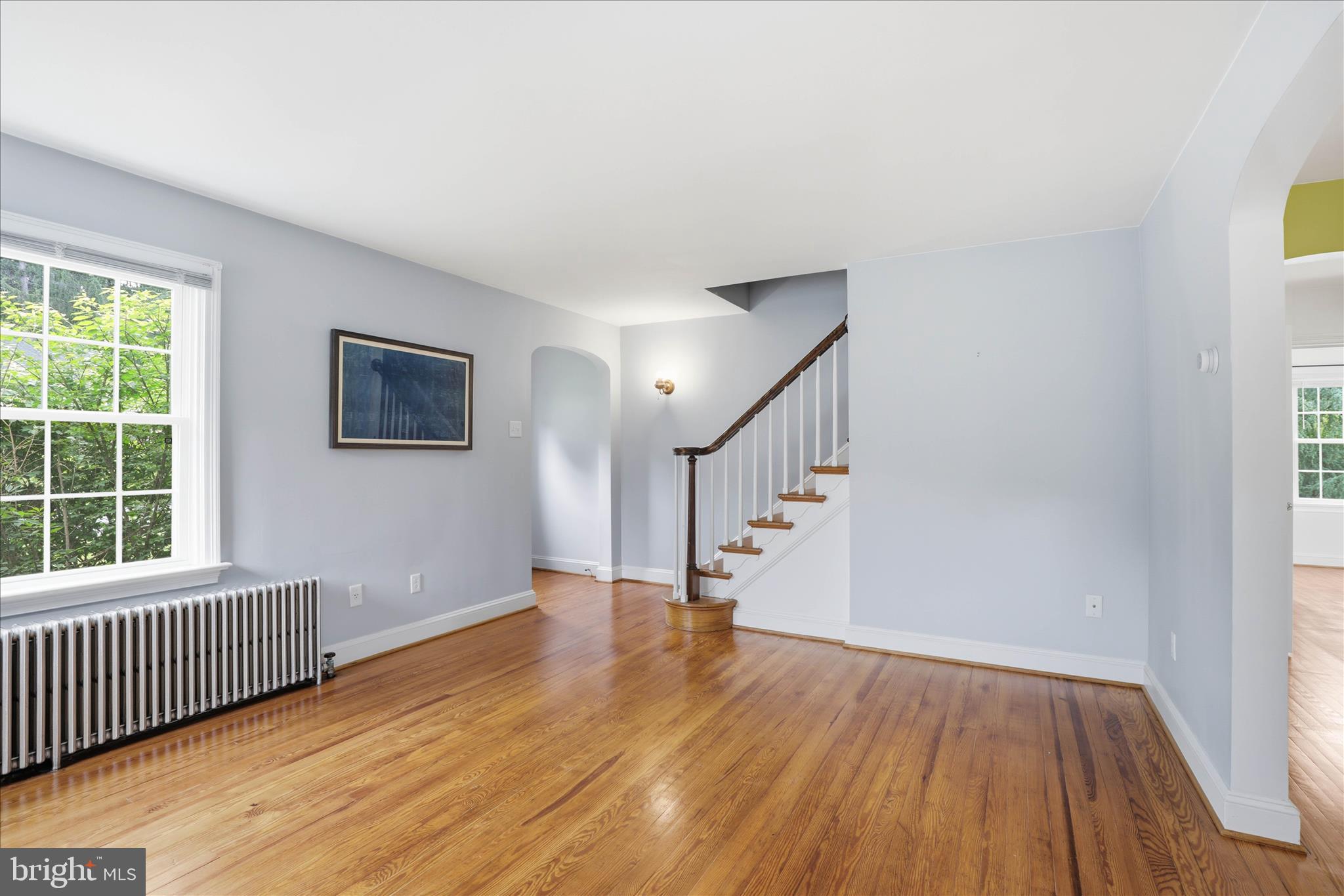 169 School House Road Lancaster, PA 17603 - Photo 6 of 39 a view of an empty room with wooden floor and a window