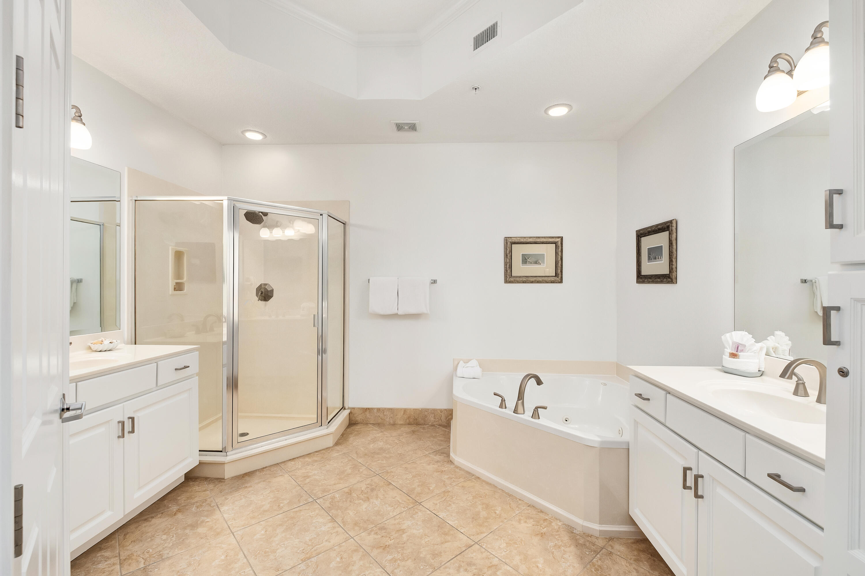 9961 East County Highway 30A, Unit 202 Inlet Beach, FL 32461 - Photo 16 of 44 a bathroom with a tub sink double vanity and a mirror