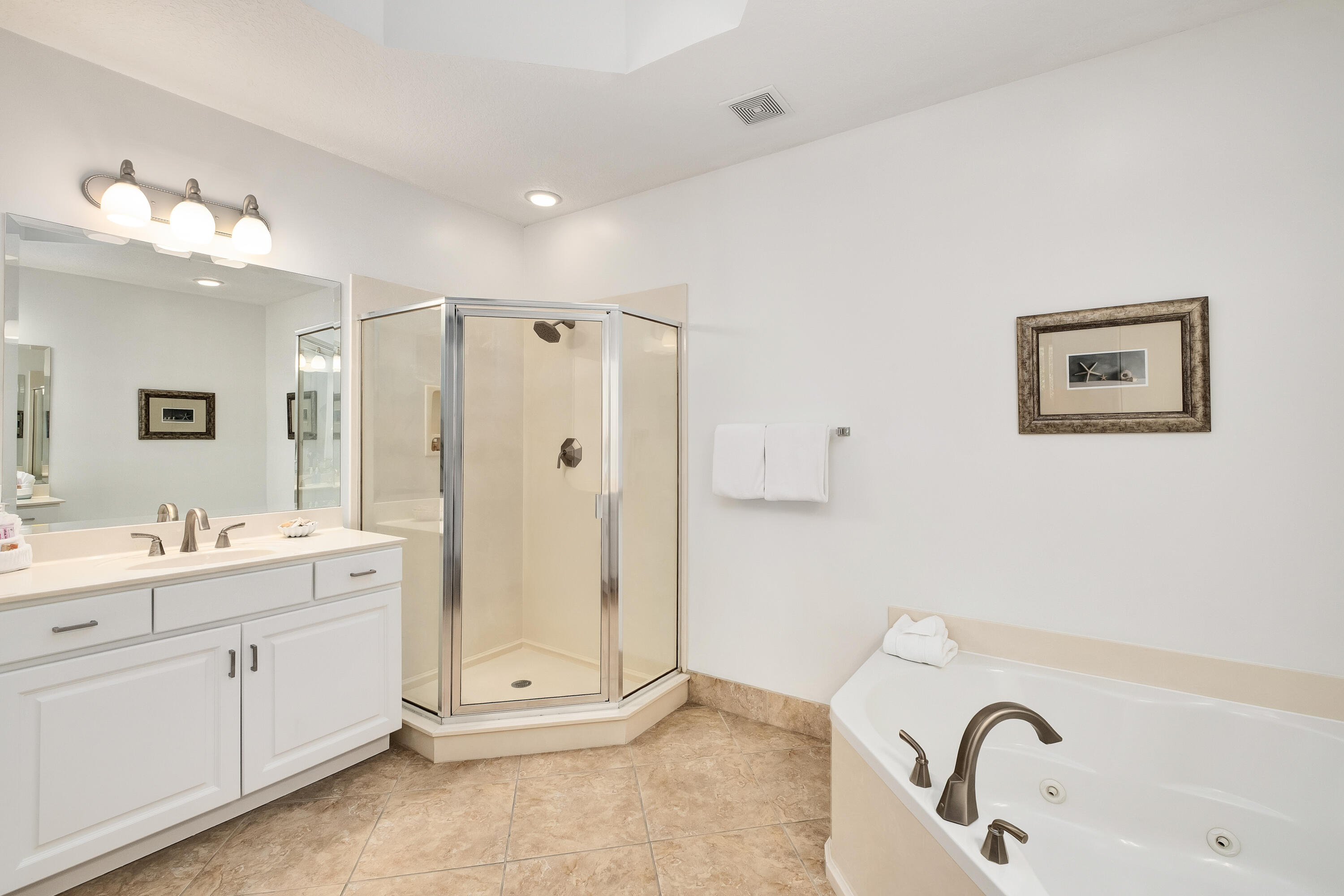 9961 East County Highway 30A, Unit 202 Inlet Beach, FL 32461 - Photo 19 of 44 a bathroom with a double vanity sink mirror and bathtub