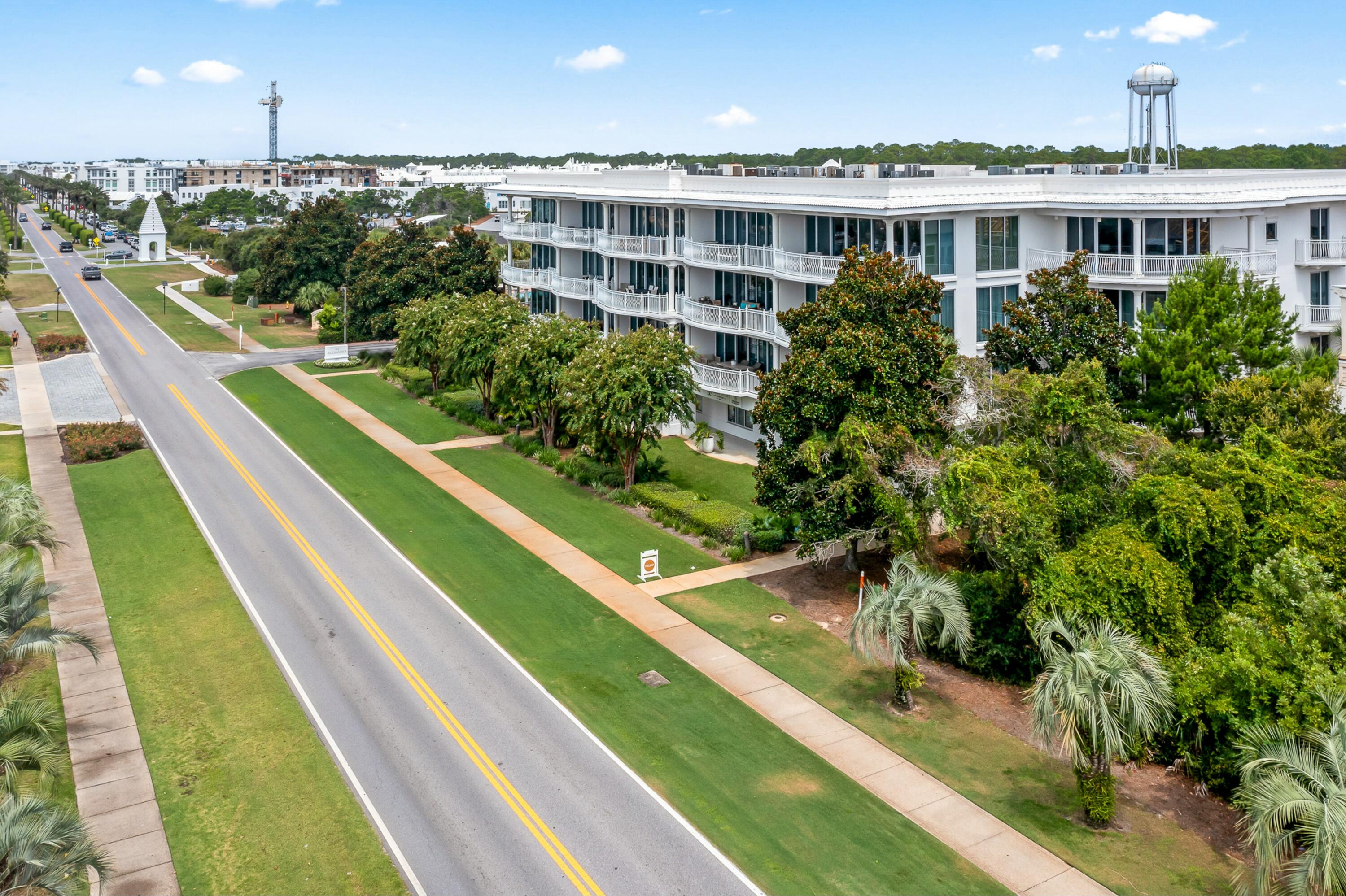 9961 East County Highway 30A, Unit 202 Inlet Beach, FL 32461 - Photo 39 of 44 a view of a house with a yard