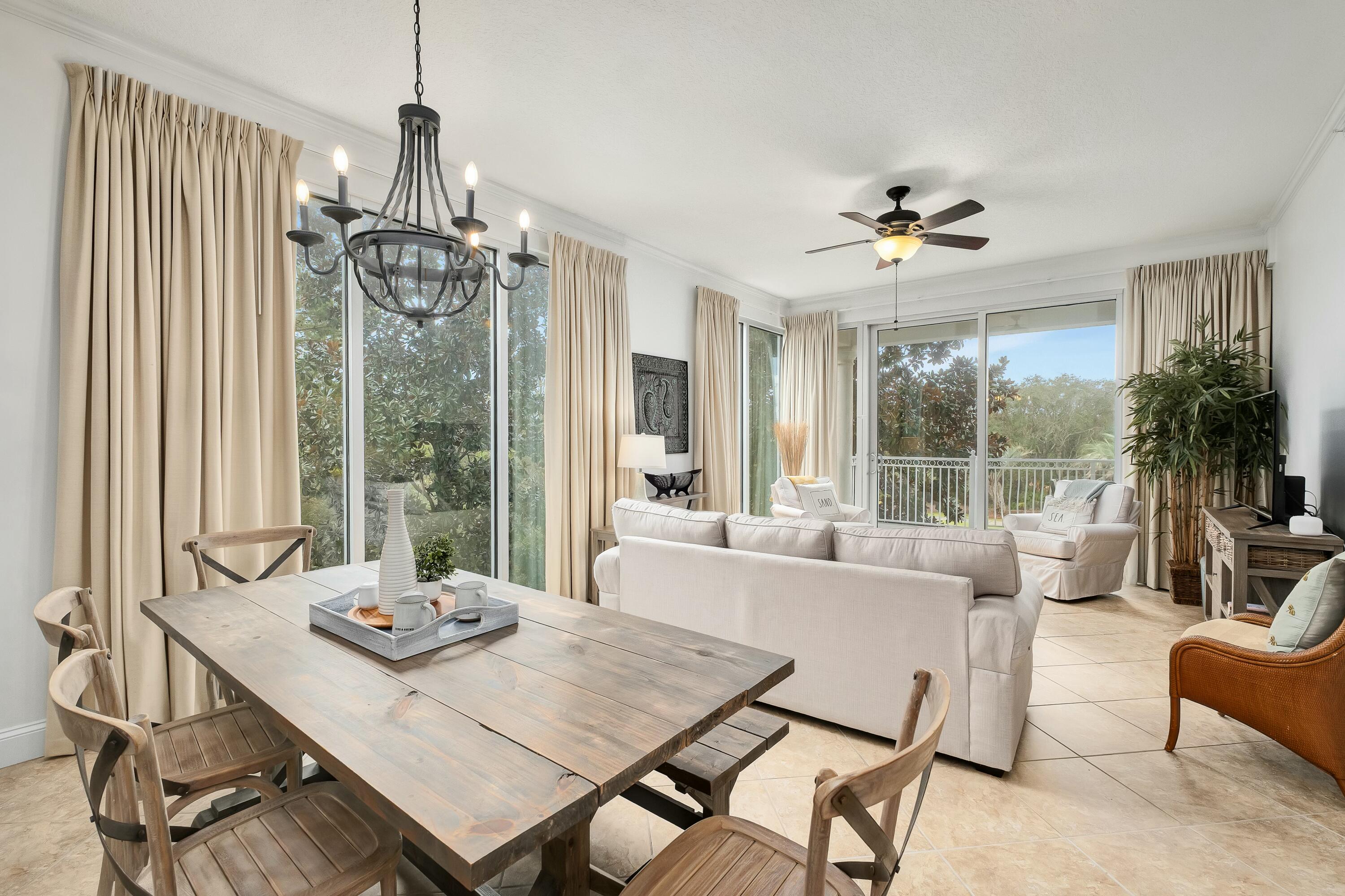9961 East County Highway 30A, Unit 202 Inlet Beach, FL 32461 - Photo 9 of 44 a view of a dining room with furniture window and outside view