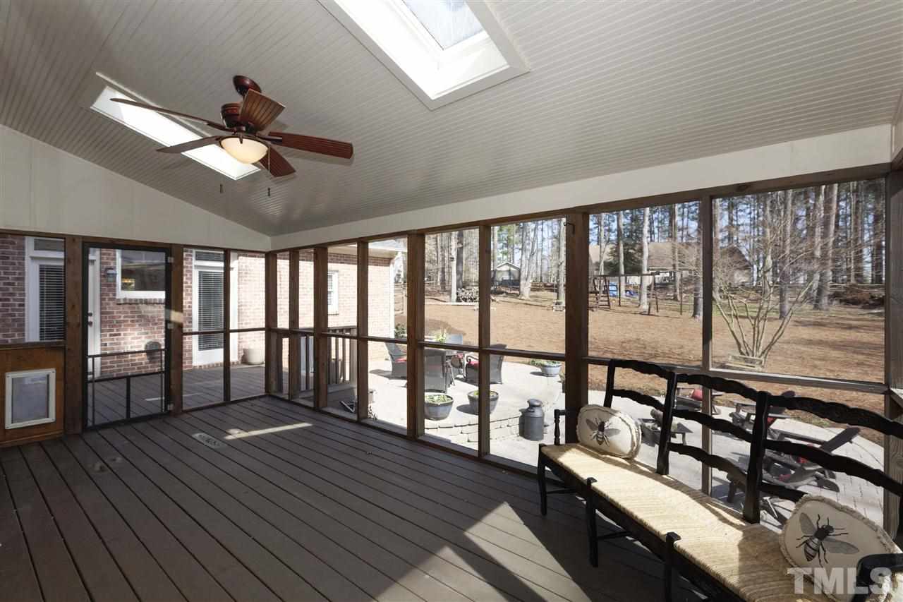 6300 Battleview Drive Raleigh, NC 27613 - Photo 12 of 25 a view of a porch with wooden floor