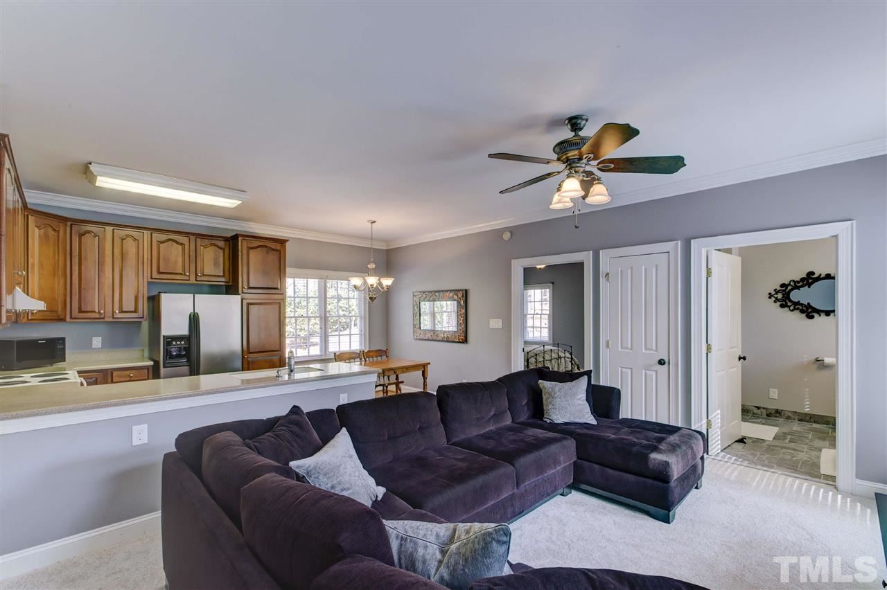 6300 Battleview Drive Raleigh, NC 27613 - Photo 15 of 25 a living room with furniture kitchen view and a large window