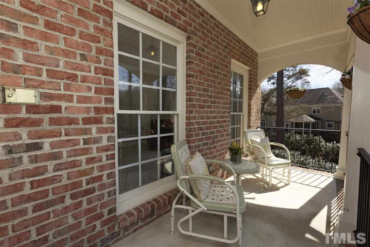6300 Battleview Drive Raleigh, NC 27613 - Photo 3 of 25 a balcony with table and chairs