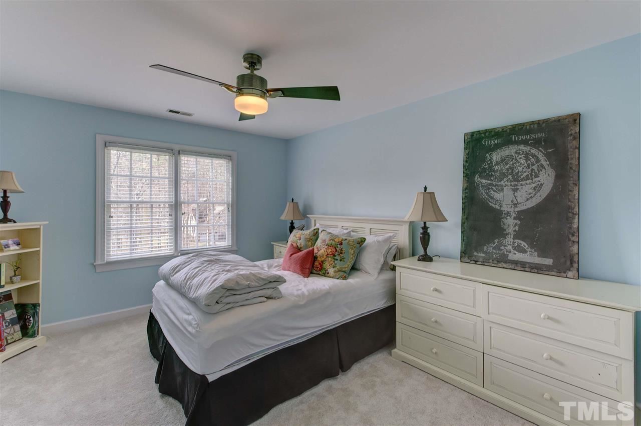 6300 Battleview Drive Raleigh, NC 27613 - Photo 21 of 25 a bedroom with bed and window