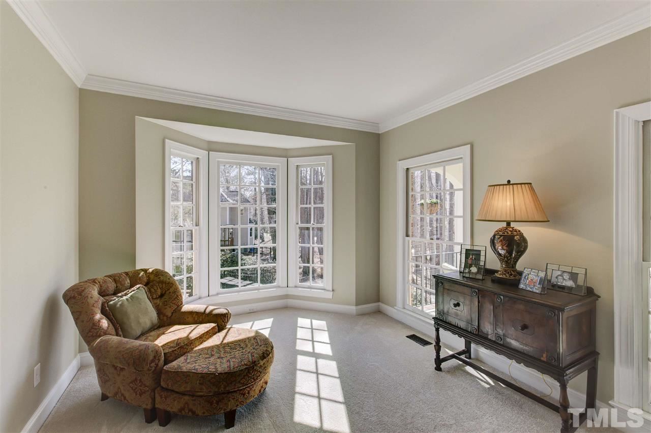 6300 Battleview Drive Raleigh, NC 27613 - Photo 4 of 25 a living room with furniture and a window