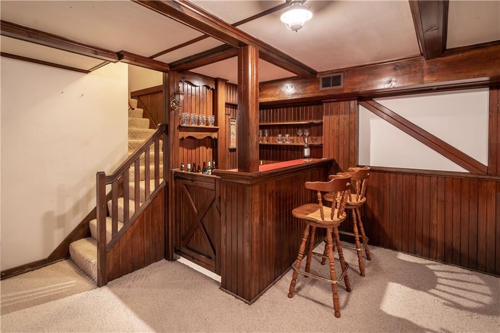 121 Sylvania Drive Pittsburgh, PA 15236 - Photo 14 of 25 LOWER LEVEL GAME ROOM WITH WET BAR.