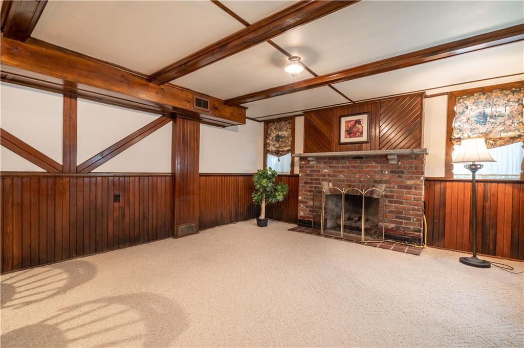 121 Sylvania Drive Pittsburgh, PA 15236 - Photo 15 of 25 ANOTHER VIEW OF THE GAME ROOM WITH GAS LOG FIREPLACE.
