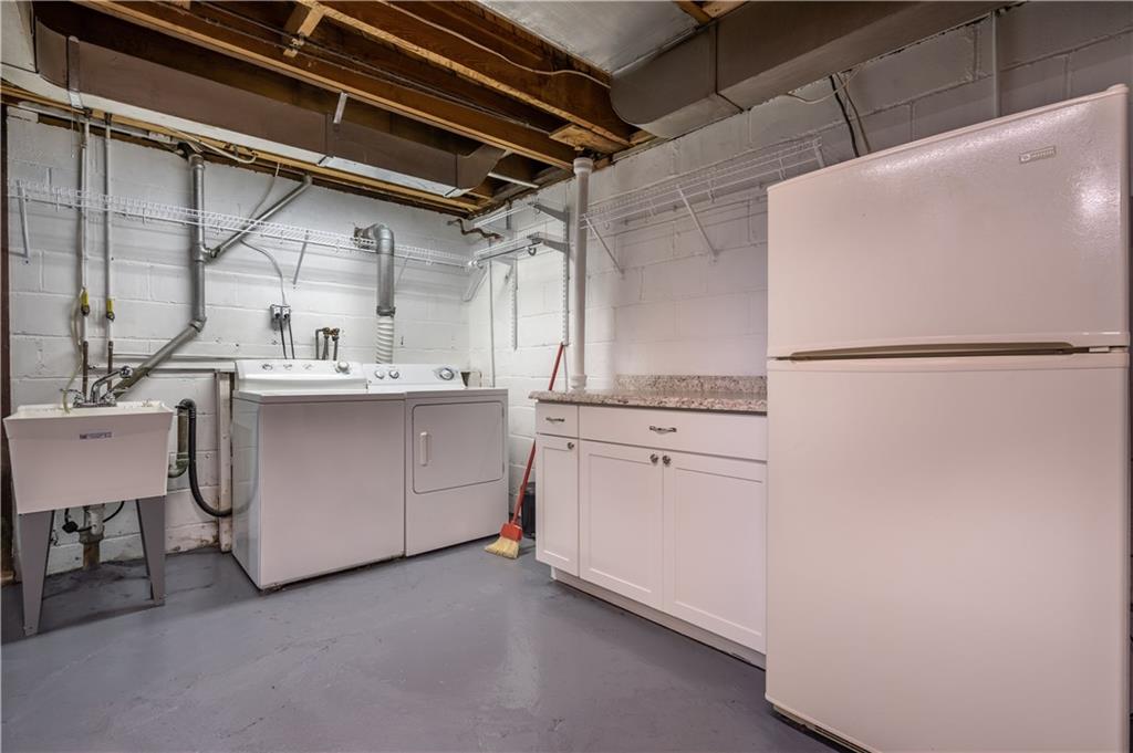 121 Sylvania Drive Pittsburgh, PA 15236 - Photo 16 of 25 LAUNDRY AREA WITH EXTRA FRIG FOR YOU TO HELP WHEN YOU ARE ENTERTAINING IN THE GAME ROOM AROUND THE CORNER.