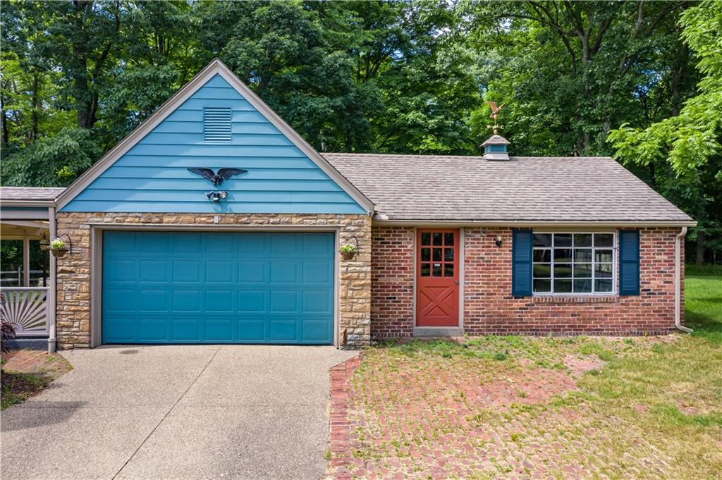 121 Sylvania Drive Pittsburgh, PA 15236 - Photo 3 of 25 DOUBLE DETACHED GARAGE WITH A THIRD GARAGE FOR LAWN EQUIPMENT STORAGE.