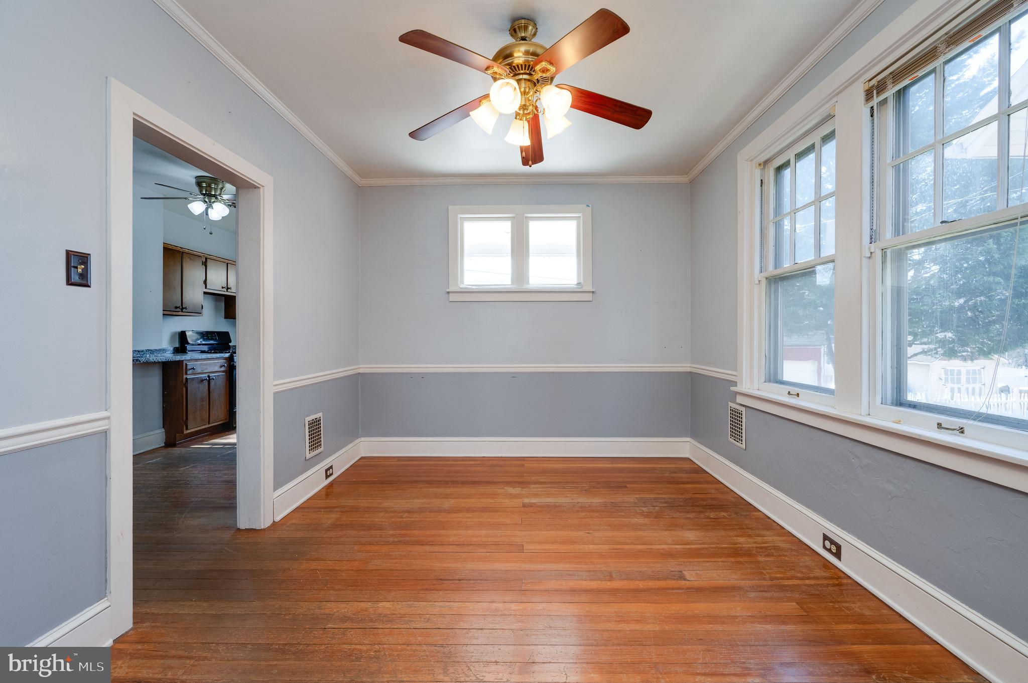 7 Marshall Avenue Reading, PA 19606 - Photo 11 of 36 wooden floor in an empty room with a window
