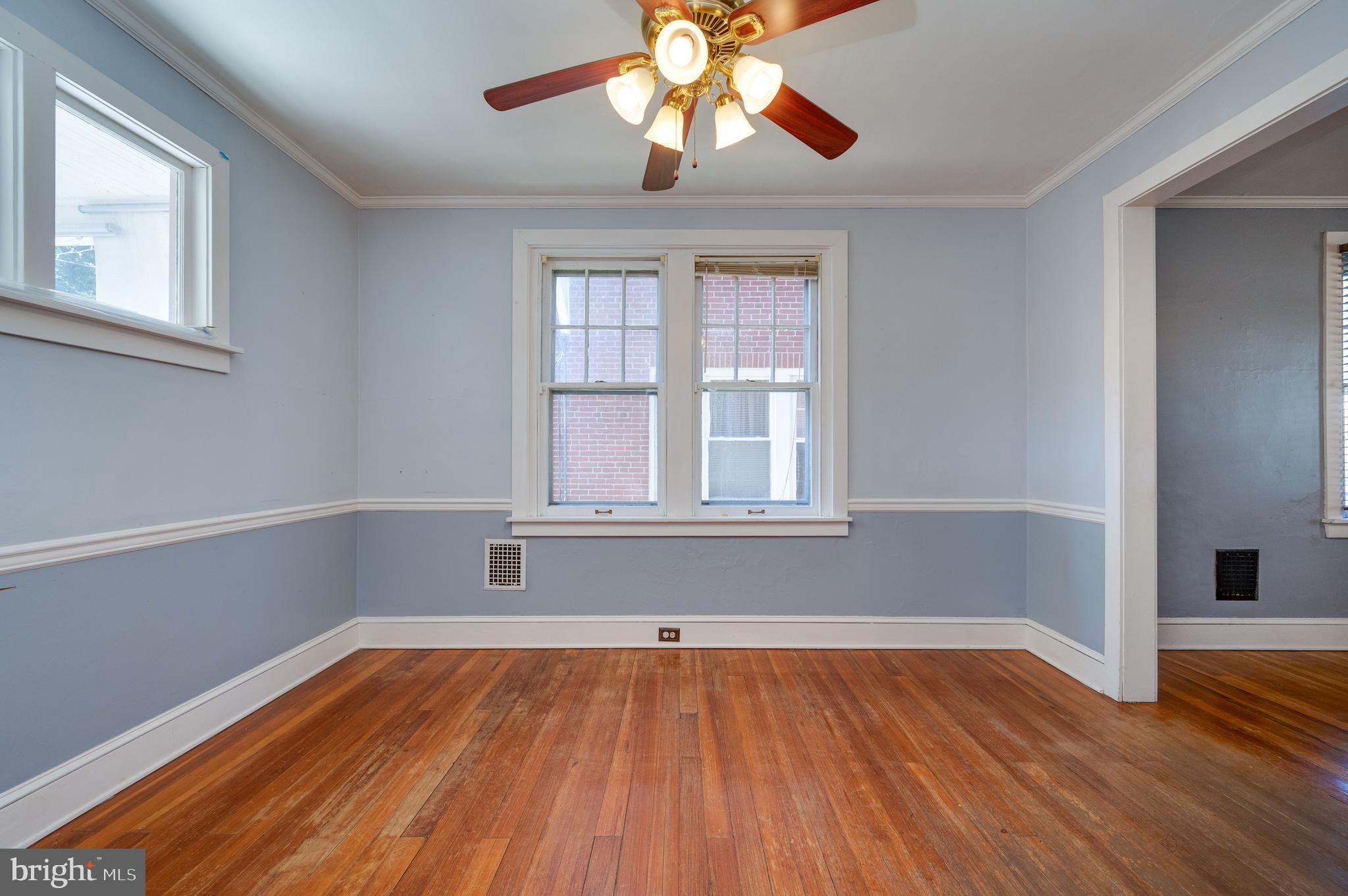 7 Marshall Avenue Reading, PA 19606 - Photo 12 of 36 a view of empty room with wooden floor and fan