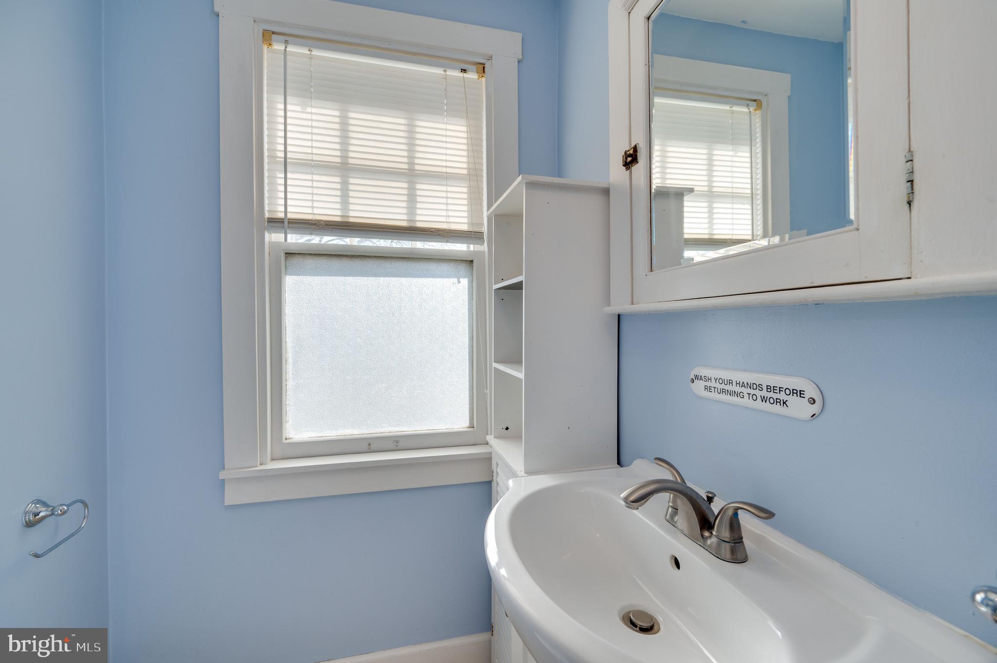7 Marshall Avenue Reading, PA 19606 - Photo 19 of 36 a bathroom with a sink and a window