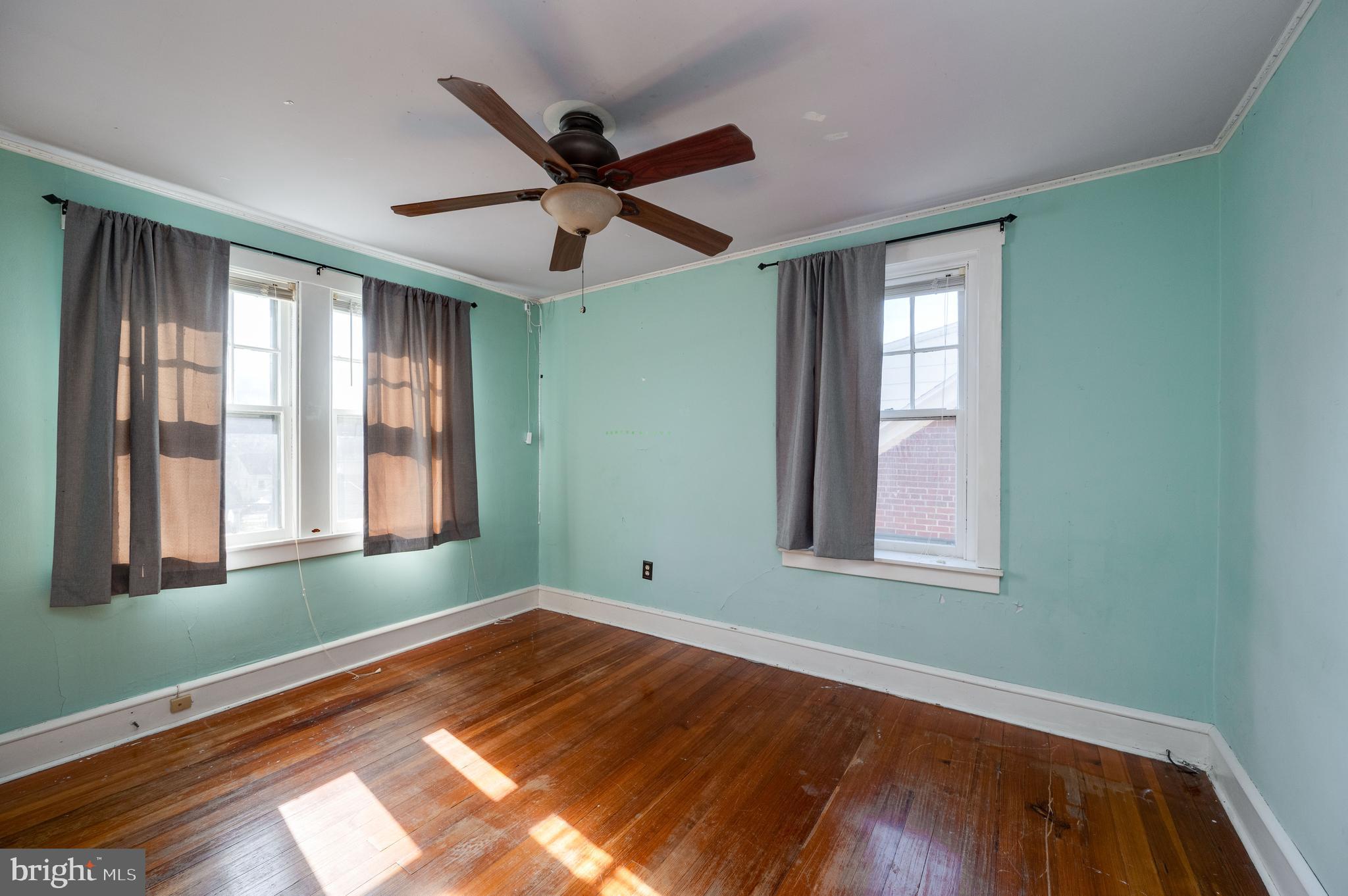 7 Marshall Avenue Reading, PA 19606 - Photo 20 of 36 a view of empty room with wooden floor and fan