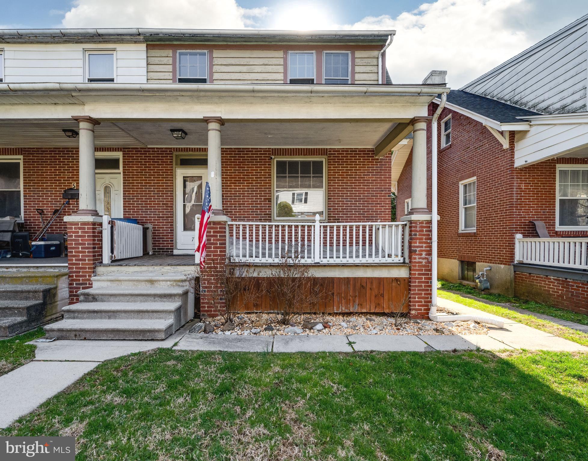 7 Marshall Avenue Reading, PA 19606 - Photo 2 of 36 a front view of a house with a yard