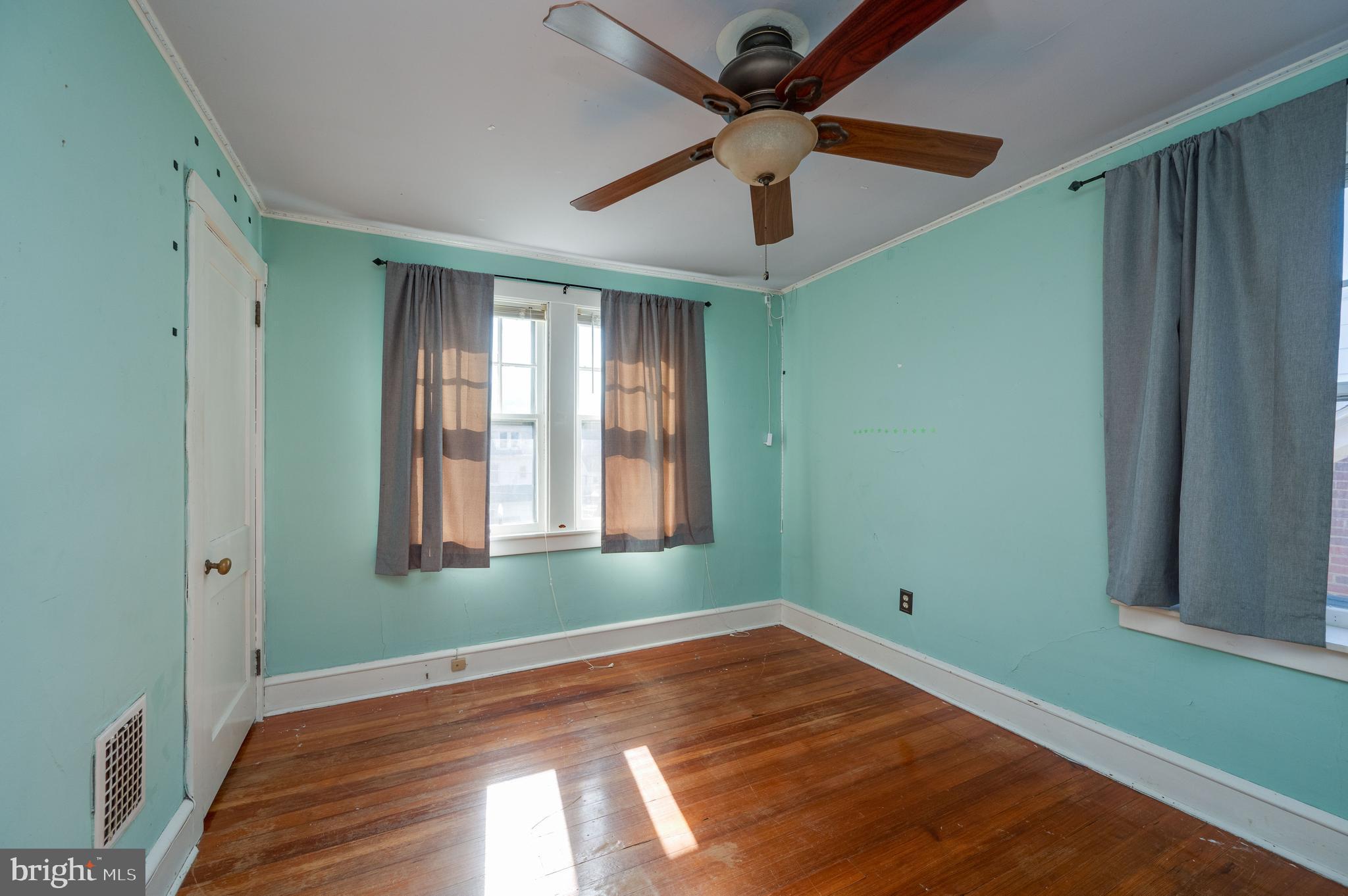 7 Marshall Avenue Reading, PA 19606 - Photo 21 of 36 a view of empty room with wooden floor and fan