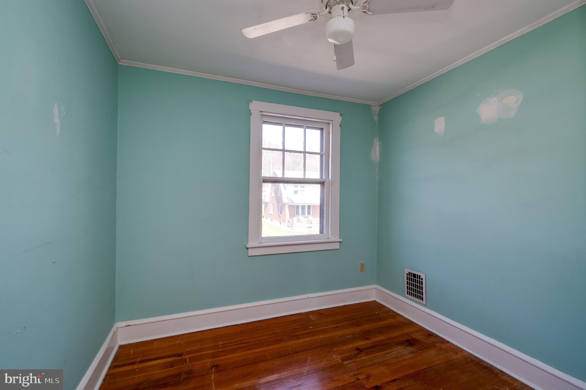 7 Marshall Avenue Reading, PA 19606 - Photo 26 of 36 a view of a room with wooden floor and fan