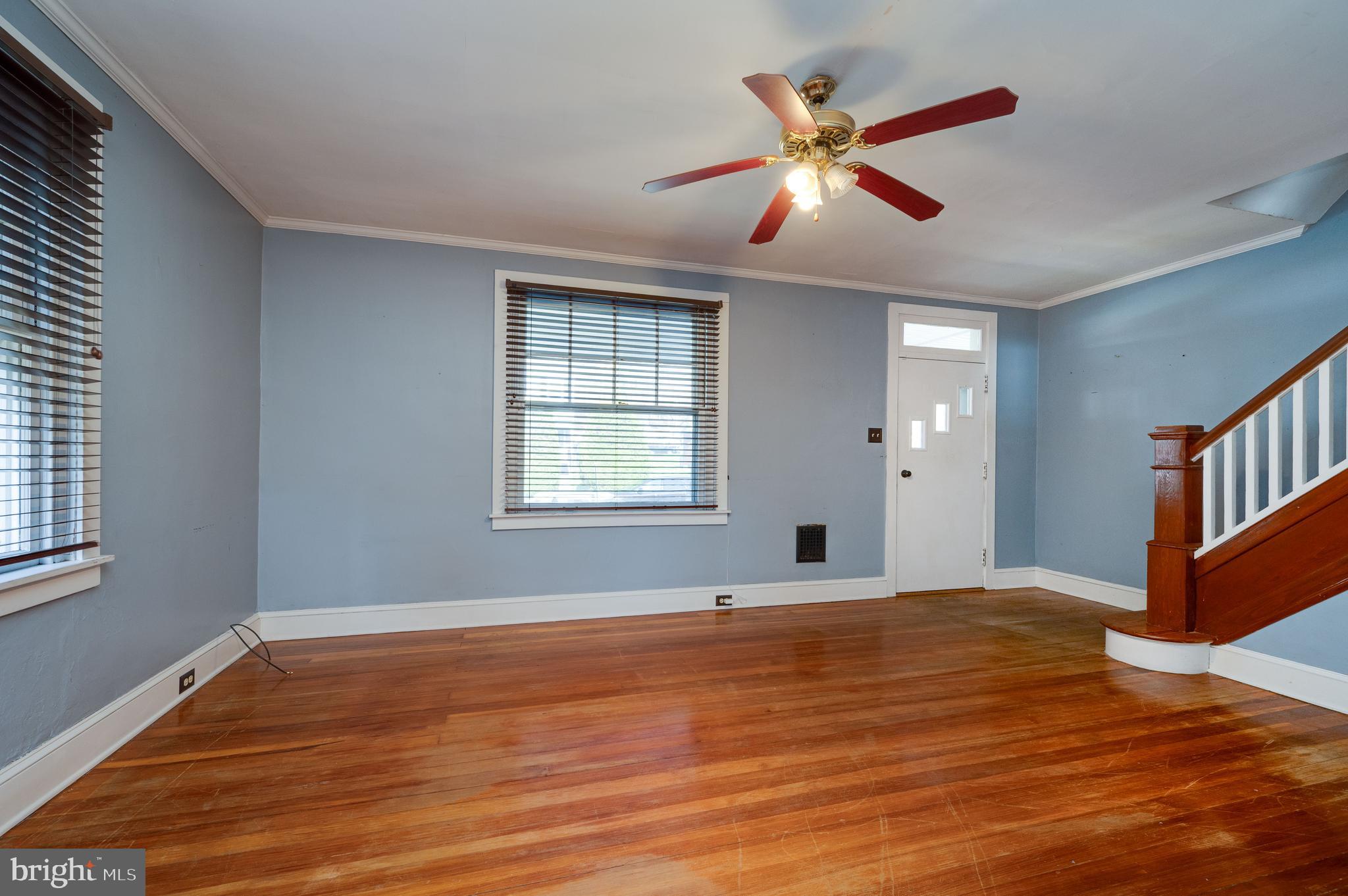 7 Marshall Avenue Reading, PA 19606 - Photo 7 of 36 a view of an empty room with window and wooden floor