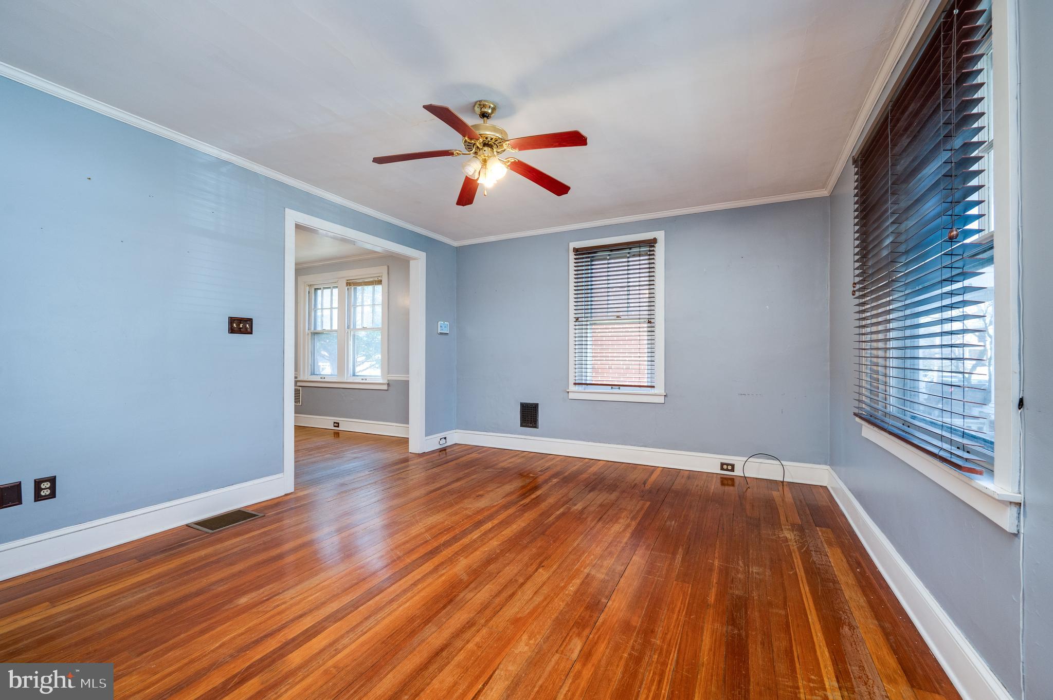 7 Marshall Avenue Reading, PA 19606 - Photo 8 of 36 a view of an empty room with window and wooden floor