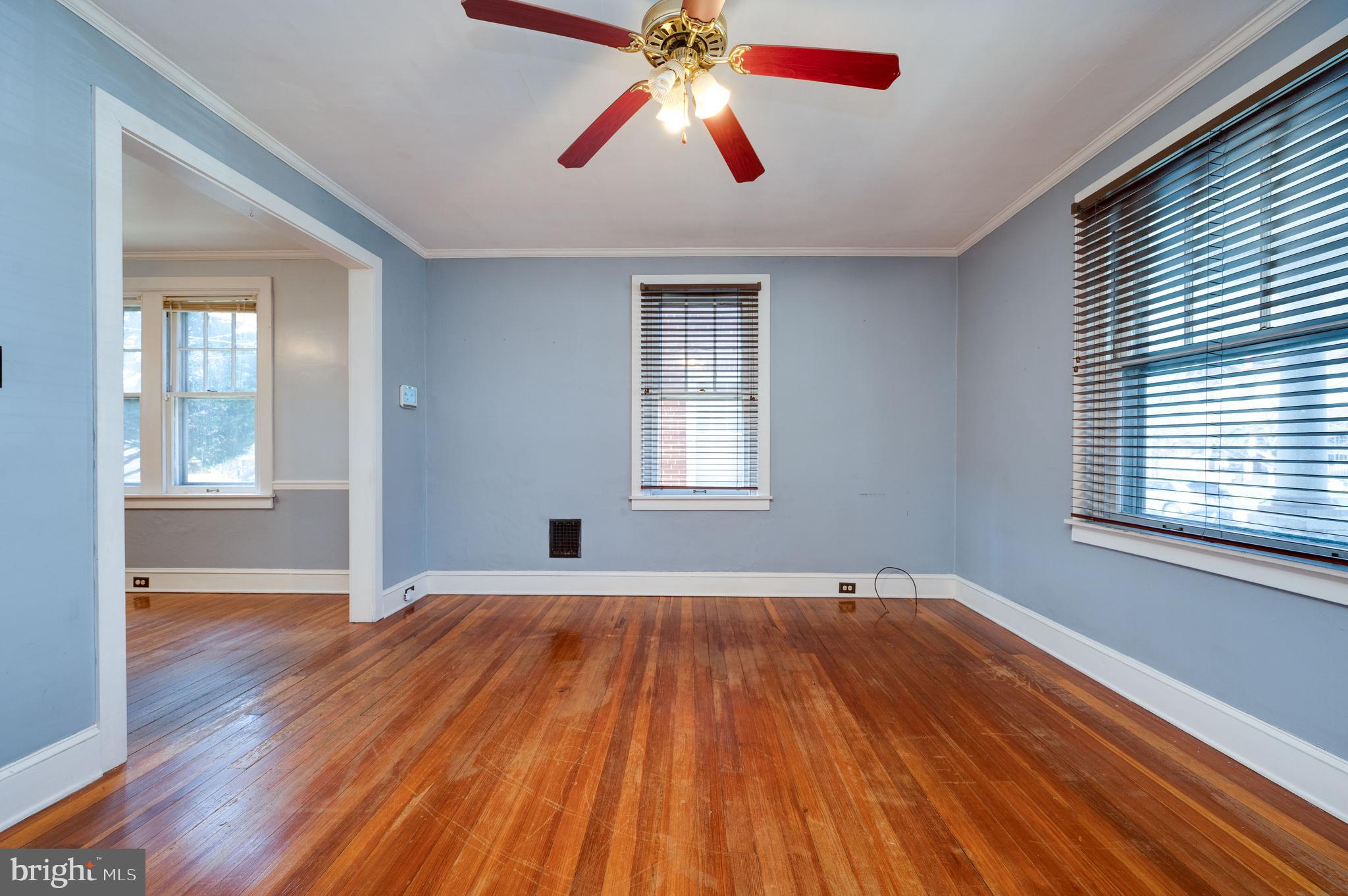 7 Marshall Avenue Reading, PA 19606 - Photo 9 of 36 a view of empty room with wooden floor and fan