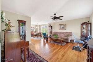 338 Pistole Road Sparta, TN 38583 - Photo 5 of 39 a living room with furniture and a wooden floor