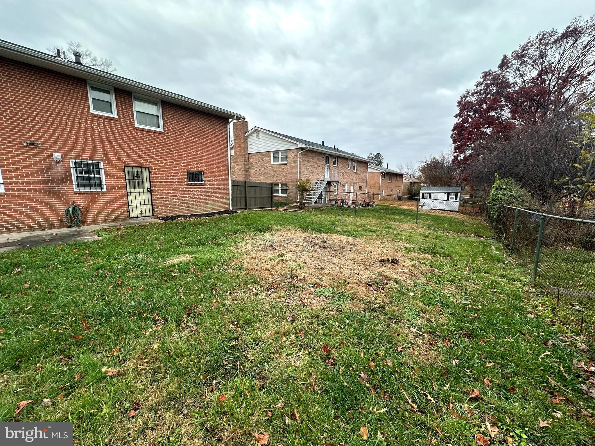 3912 21st Avenue Temple Hills, MD 20748 - Photo 12 of 36 a view of a yard in front of a house with large tree