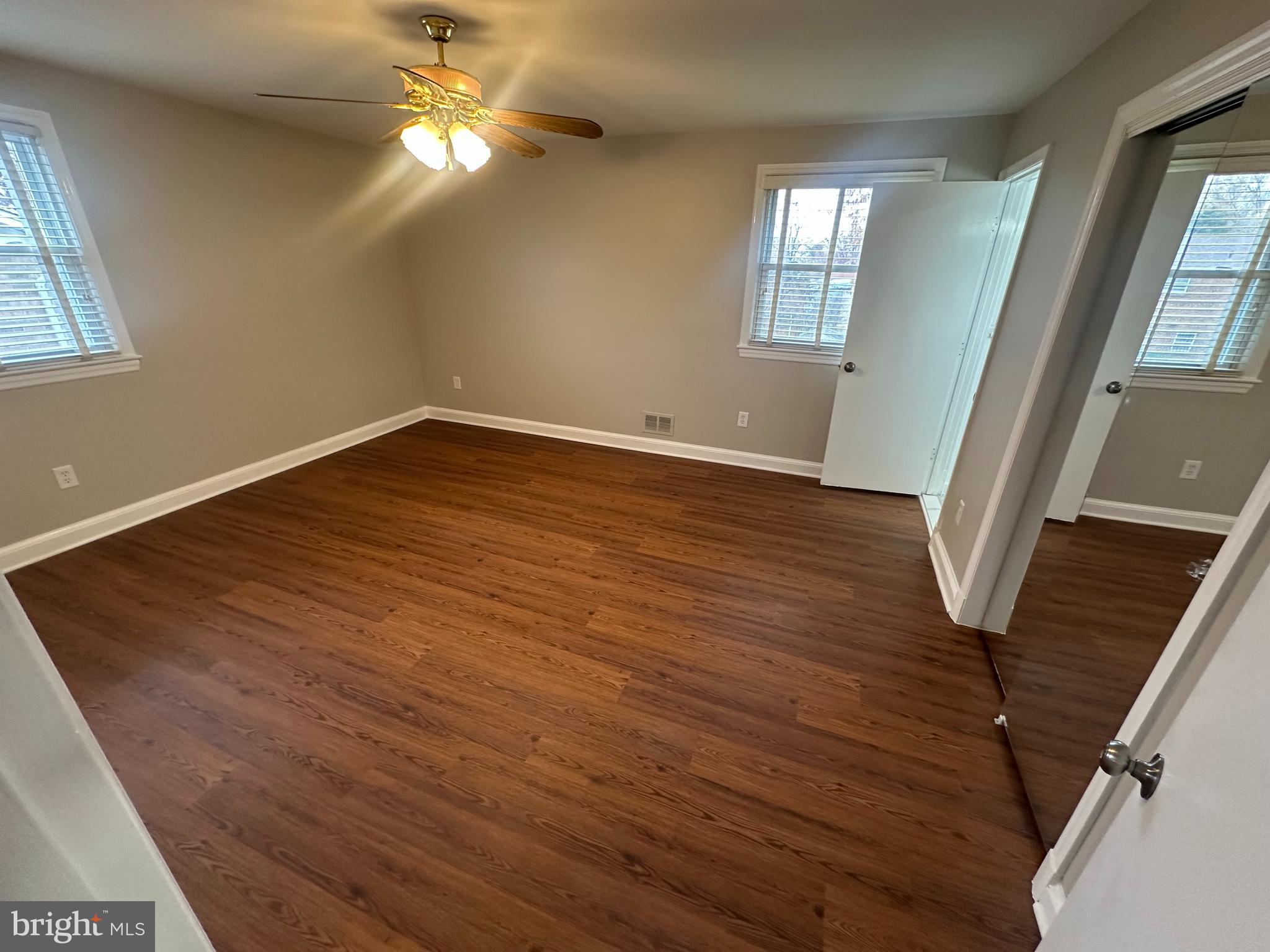 3912 21st Avenue Temple Hills, MD 20748 - Photo 20 of 36 a view of empty room with wooden floor and fan