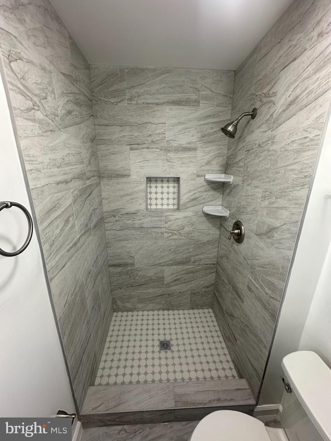 3912 21st Avenue Temple Hills, MD 20748 - Photo 23 of 36 a bathroom with a sink toilet and shower