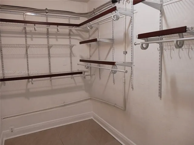 a view of a room with racks on the wall