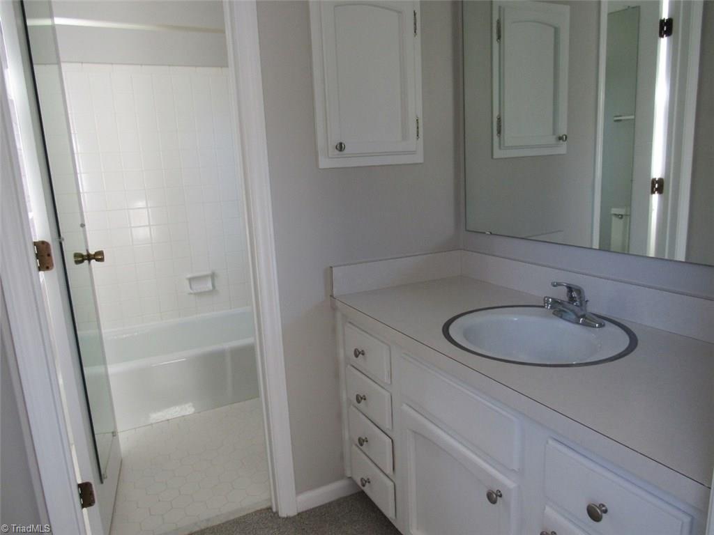 4502 Knightbridge Road Greensboro, NC 27455 - Photo 11 of 15 Master Shower with separate area for dressing
