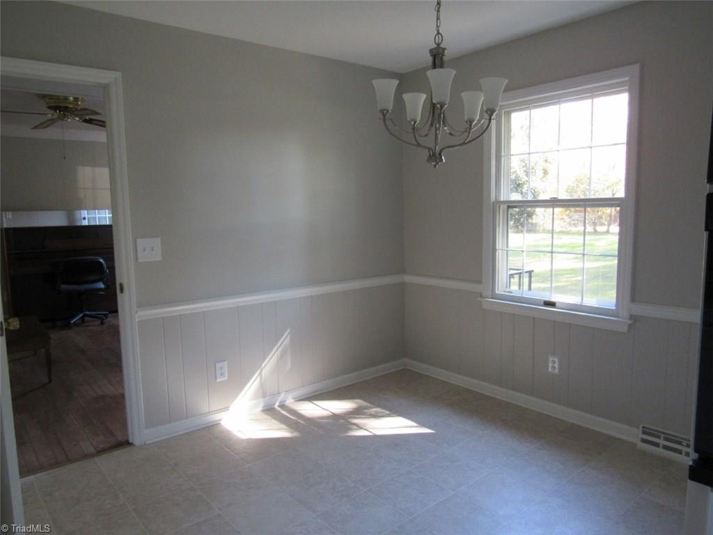 4502 Knightbridge Road Greensboro, NC 27455 - Photo 7 of 15 Great Breakfast area. Freshly painted and new flood
