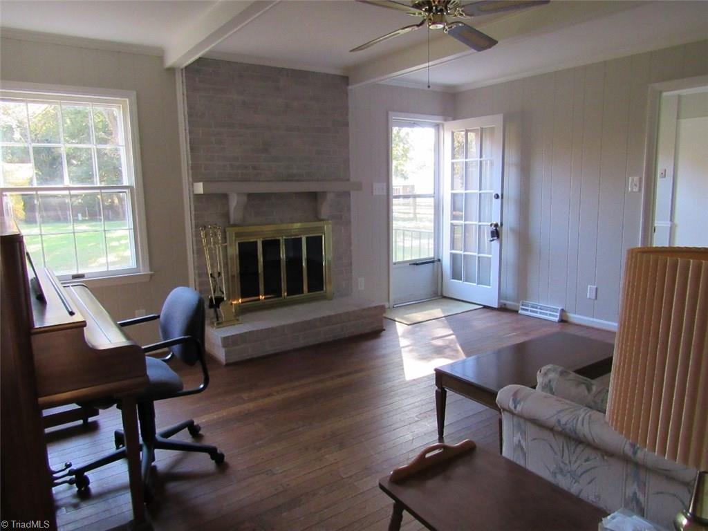 4502 Knightbridge Road Greensboro, NC 27455 - Photo 9 of 15 fireplace with gas logs