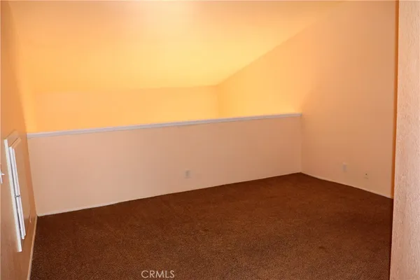 an empty room with an entryway