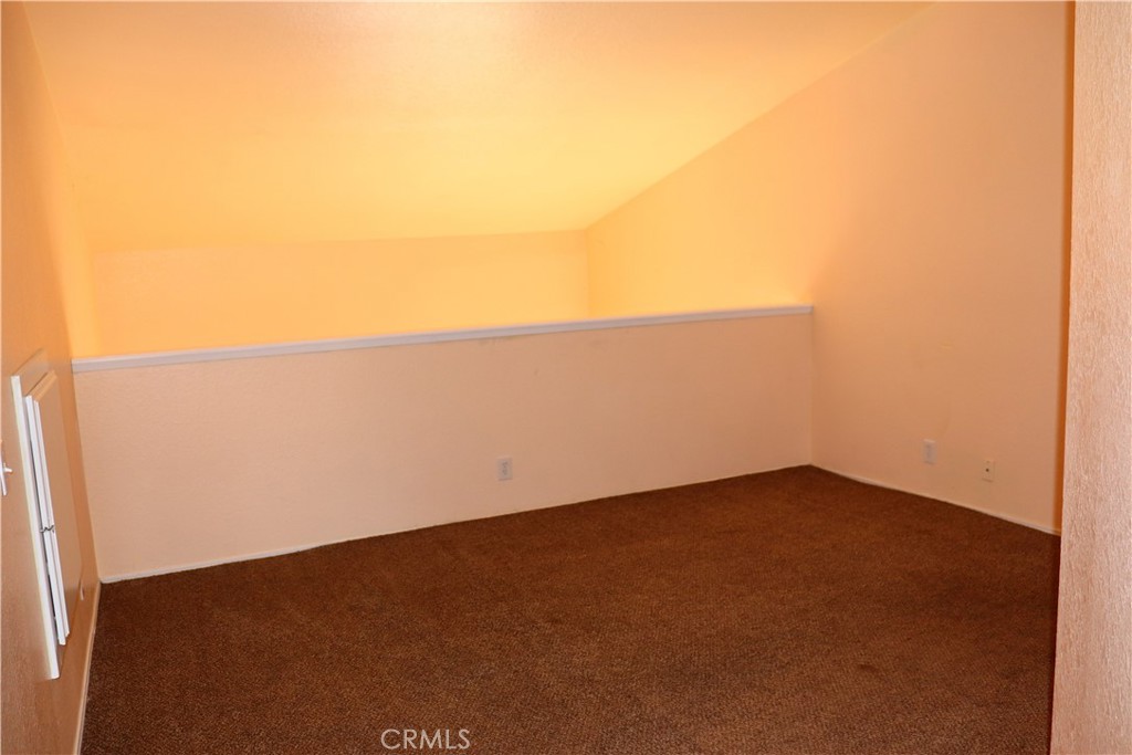 3840 Sago Street Lancaster, CA 93536 - Photo 17 of 23 an empty room with an entryway